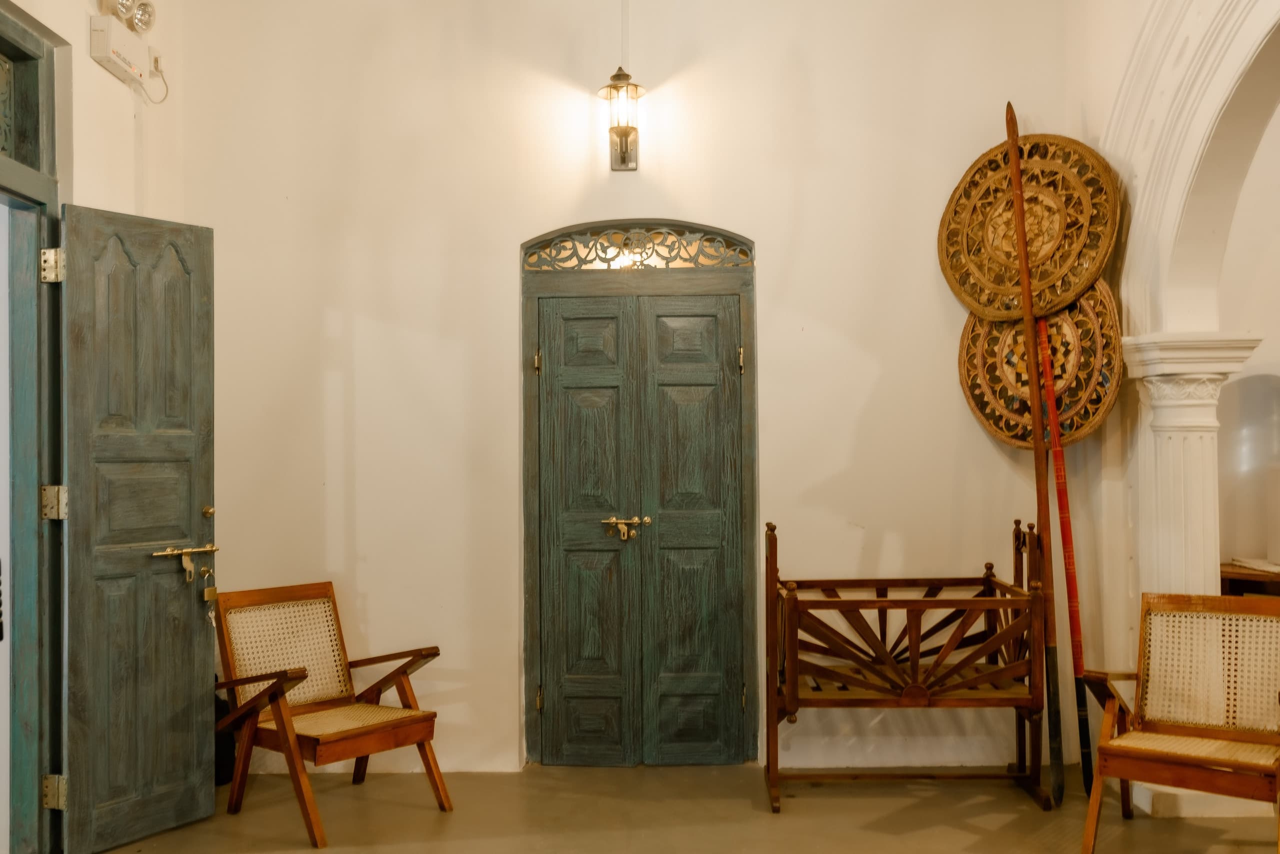 Arched green doors inside the hall, a favourite photoshoot backdrop